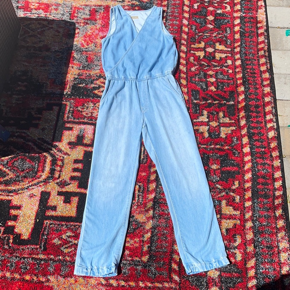 The mother supreme denim in romper.